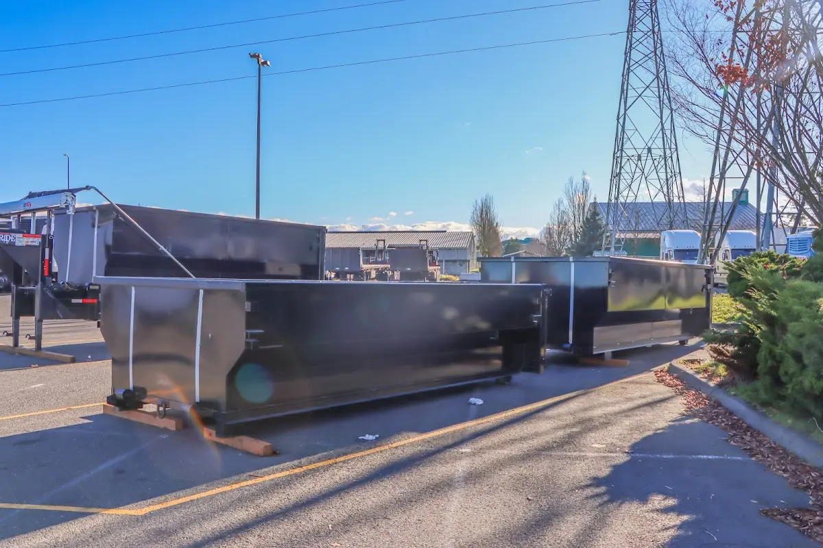 Roll-off dumpster ready for waste disposal at job site for 15 Yard Dumpster Rental in Berlin